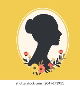 Silhouette of a girl with flowers in a frame on a yellow background.