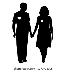 silhouette of a girl and a guy on a background of hearts