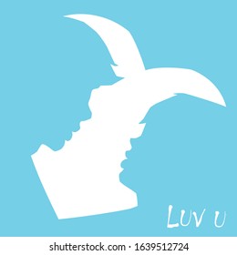 Silhouette of a girl and a guy on a background of the heart. Blue background and the inscription below - I love you.
