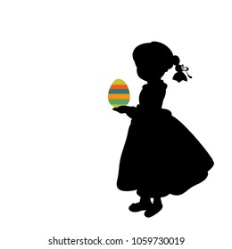 Silhouette girl holds easter egg colorful