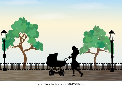 Silhouette of a girl on a walk with a stroller in the park.