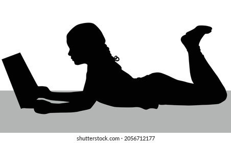 Silhouette of a girl reading a book.