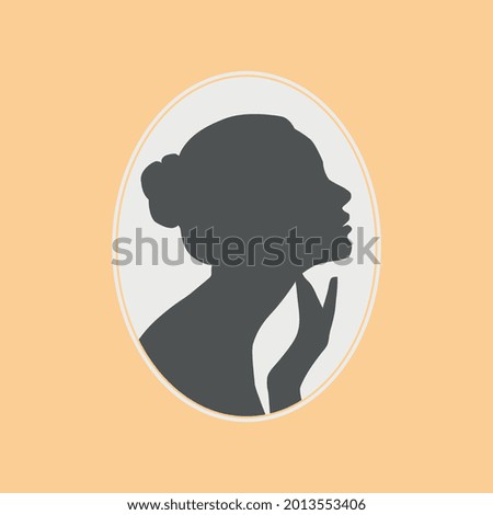 silhouette of a girl in a round frame