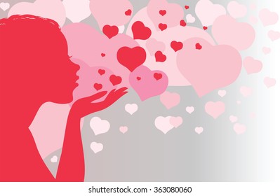 Silhouette of a girl sending a kiss with hearts. Female hand with hearts. St. Valentine's Day.