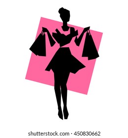 Silhouette of girl with shopping bags on a pink background