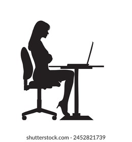 Silhouette of a girl sitting at a computer