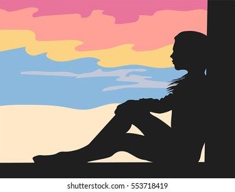 Silhouette of girl at sunset.