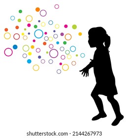 Silhouette of a girl trying to catch circles