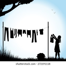 silhouette of girl who stretches the laundry