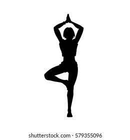 silhouette of a girl in a yoga pose