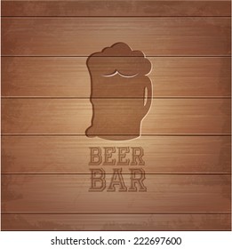 silhouette of glass of Beer on wood background