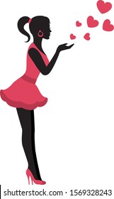 Silhouette graceful woman in pink dress sends an air kiss and hearts
