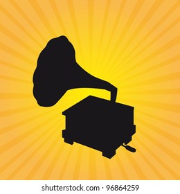 silhouette gramophone over yellow background. vector