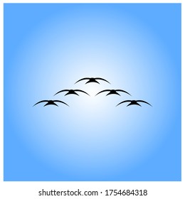 silhouette of a group flying birds vector