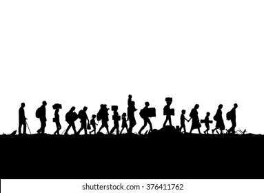 Silhouette of a group of refugees walking through a field