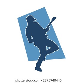 Silhouette of a guitarist man in performing pose. Silhouette of a musician performing with his guitar musical instrument.