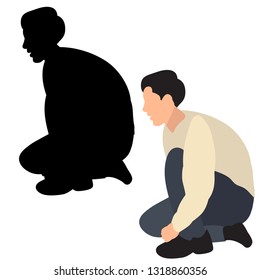 the silhouette of a guy sitting
