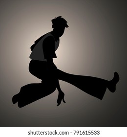 Silhouette of guy wearing wide trousers, dancing Soul