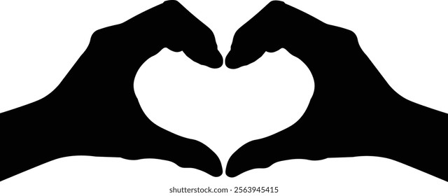 the silhouette of hand makes a shape of heart.
