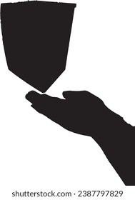 a silhouette of hand and object.