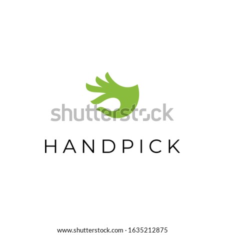 silhouette of a hand picking something