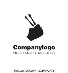 silhouette of hands holding drumsticks suitable for music studio logo