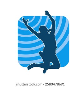 Silhouette of a happy slim female jumping cheerfully.