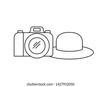 silhouette of hat with ribbon and camera photographic