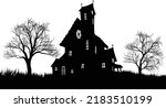 A silhouette haunted Halloween house with spooky trees