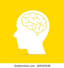 Silhouette head with the brain on the yellow background. Vector illustration - Shutterstock ID 609429248