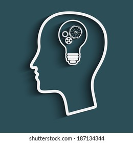 Silhouette of head with a light bulb, and gears. the concept of making big idea