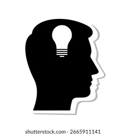 Silhouette of a Head with a Light Bulb Symbolizing Creativity and Ideas