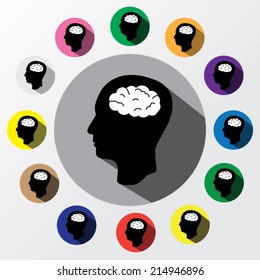 Silhouette of head and white brain with long shadow on a colorful background.