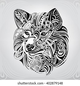 Silhouette of the head of a wolf in an ornament svg