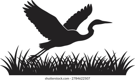 silhouette of a heron in flight over grass