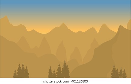 Silhouette of highlands with brown background at sunset