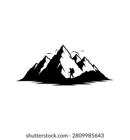 Silhouette of a hiker trekking through jagged mountain peaks