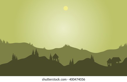 Silhouette of hills with green background at night