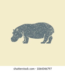 A silhouette of a hippopotamus. Flat vector icon in grunge style