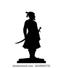 Silhouette of a historical warrior king statue.
