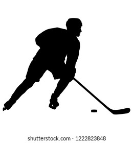 Silhouette of hockey player. Isolated on white