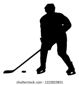 Silhouette of hockey player. Isolated on white