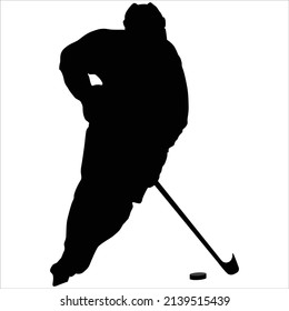 Silhouette of a hockey player with a puck