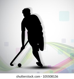 Silhouette of a hockey player with hockey stick and ball on colorful abstract wave background. EPS 10.