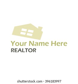 A silhouette of a house at an angle, like a shadow being cast. This could be used for a individual realtor, a realty company or a building construction business