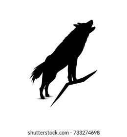 Silhouette of howling wolf.