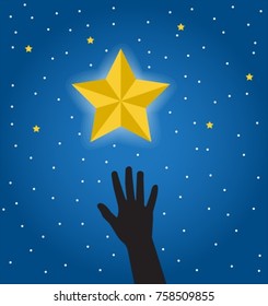 silhouette of a human hand reaching for a beautiful bright star in the night sky