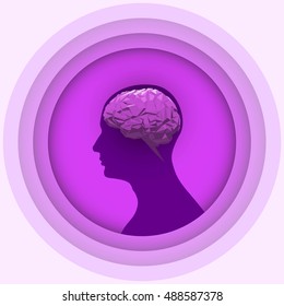 Silhouette of the human head with glowing brain.