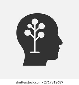 Una silueta de una cabeza humana de perfil con un icono de árbol estilizado en el interior, que representa el crecimiento, el pensamiento y el desarrollo mental.