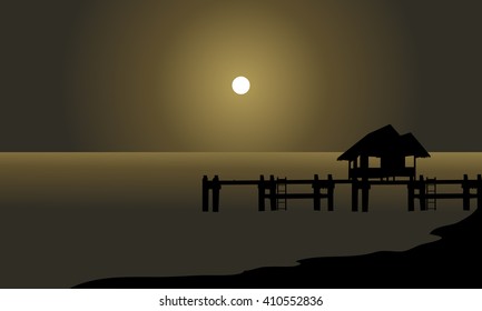 Silhouette of hut and pier at the night